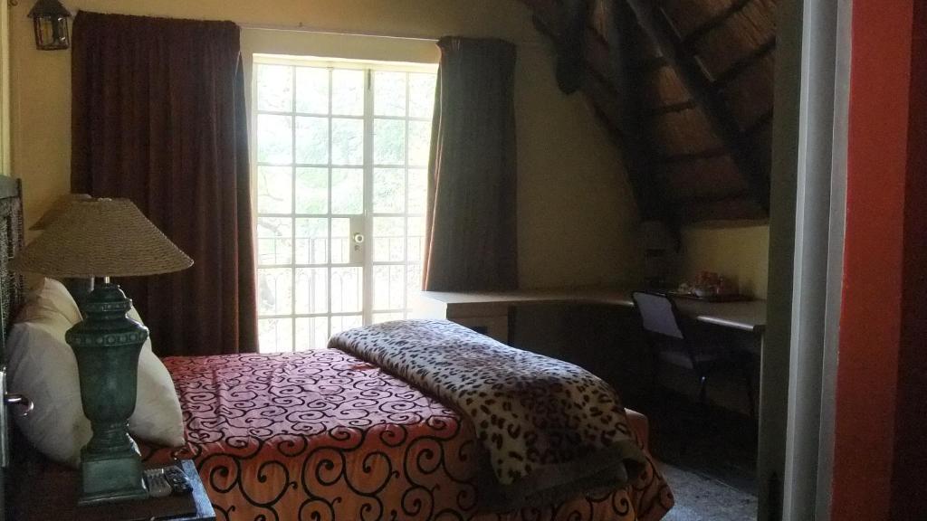 Treetops & Treats Guest House Претория Номер фото