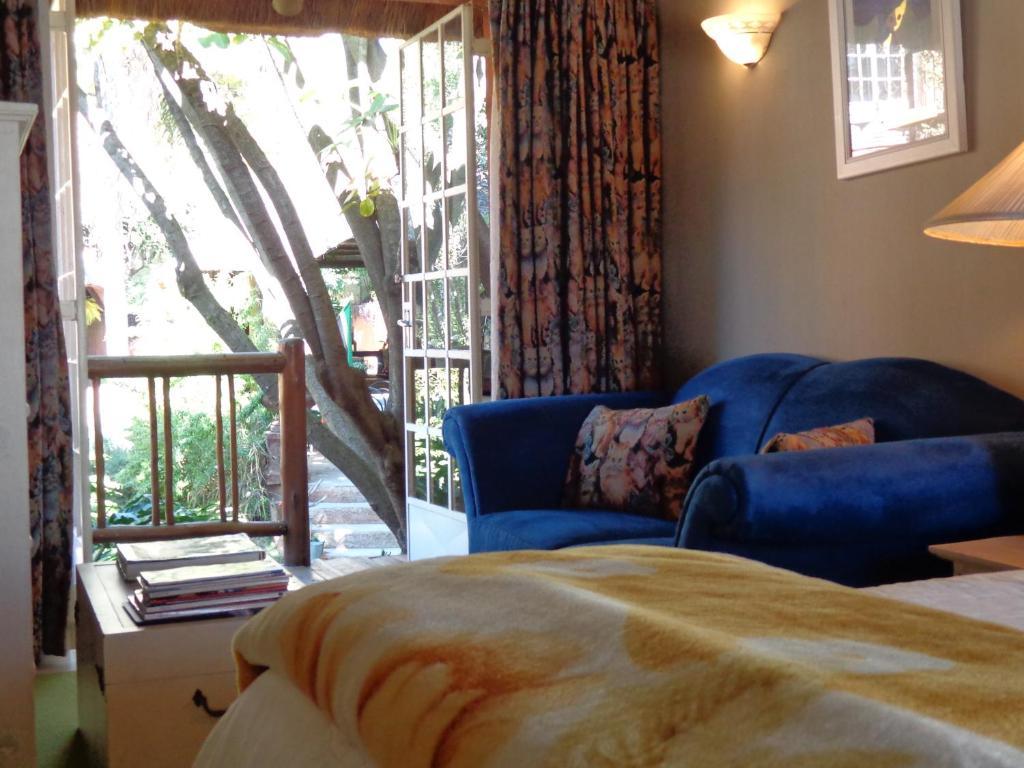 Treetops & Treats Guest House Претория Номер фото